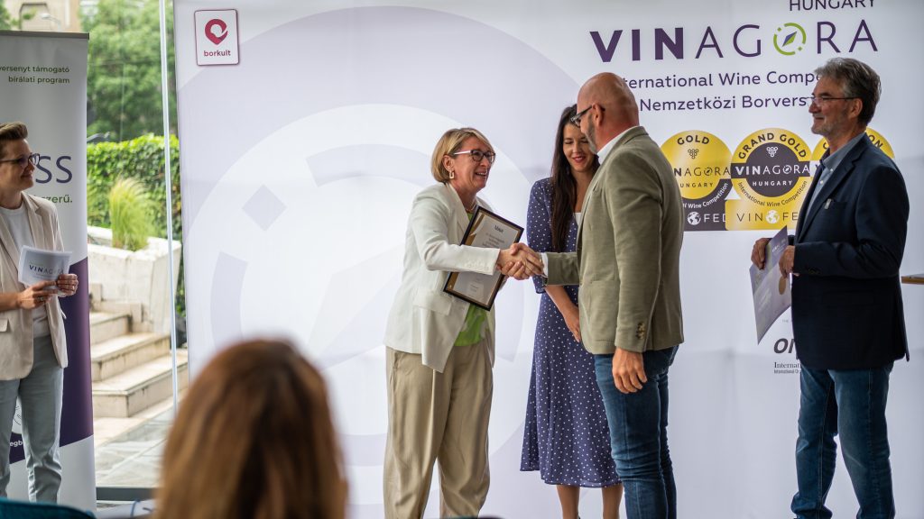 Káldi Wine winemaker receiving the gold medal at the 26th VinAgora International Wine Competition 2025.